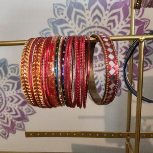 Assorted red bangles